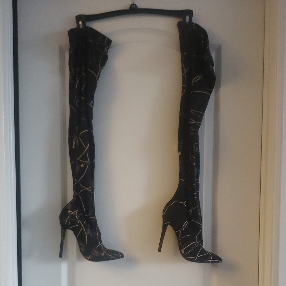 Dramatic Black and Gold Over-the-Knee Stiletto Boots